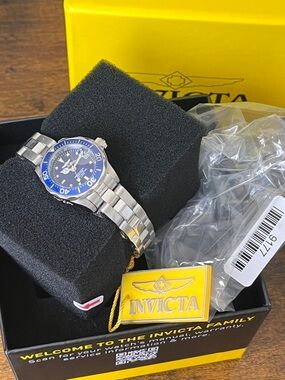 Invicta Silver Stainless Steel Watch with Blue Bezel and Dial